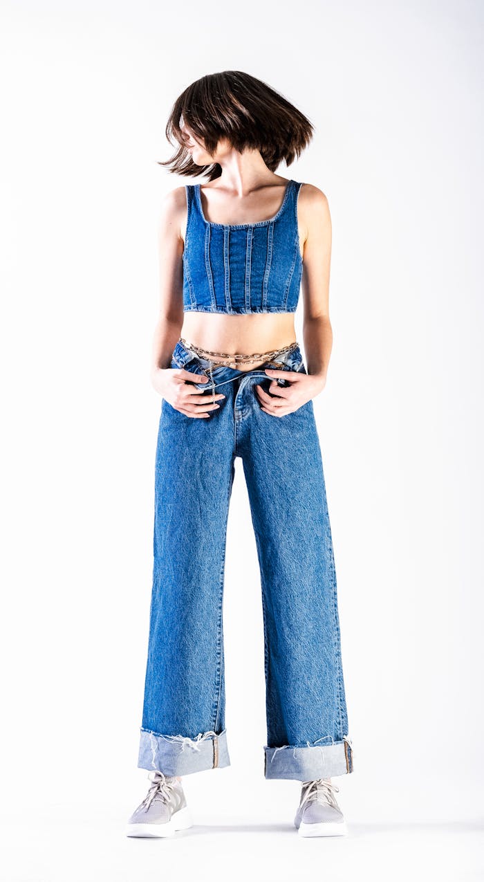 Model in chic denim ensemble showcasing modern fashion trends.